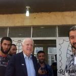 US loose senator John McCain in a memorial picture with the kidnappers of Lebanese men